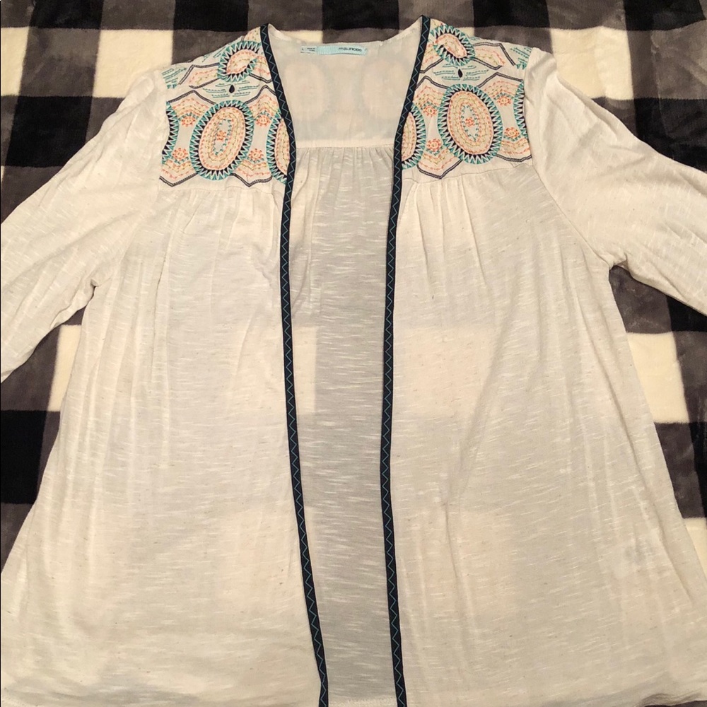 Maurice’s light cardigan